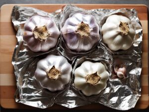Wrapping seasoned garlic in foil for air frying